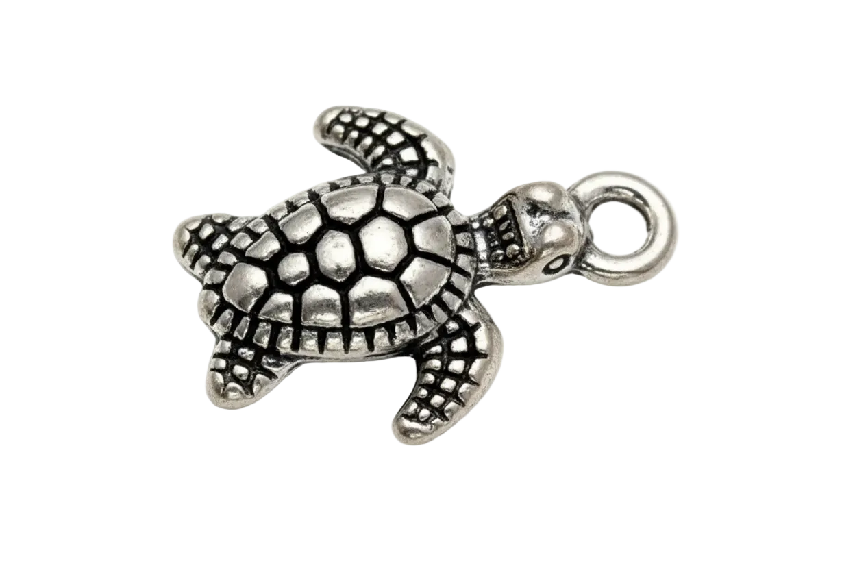Textured sea turtle charm in antiqued silver with dark recessed detailing