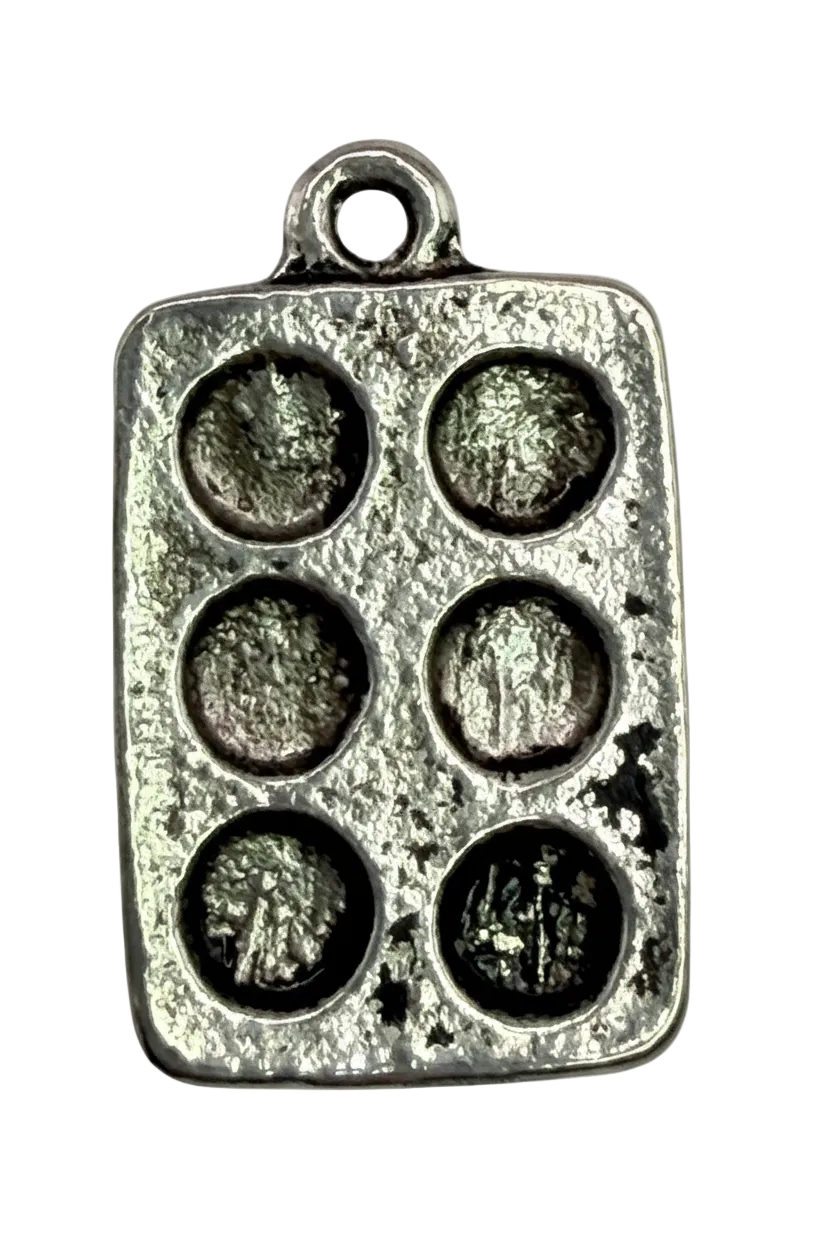 Antiqued silver muffin pan charm with six recessed cups and textured finish