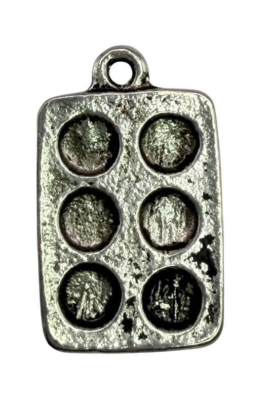 Antiqued silver muffin pan charm with six recessed cups and textured finish