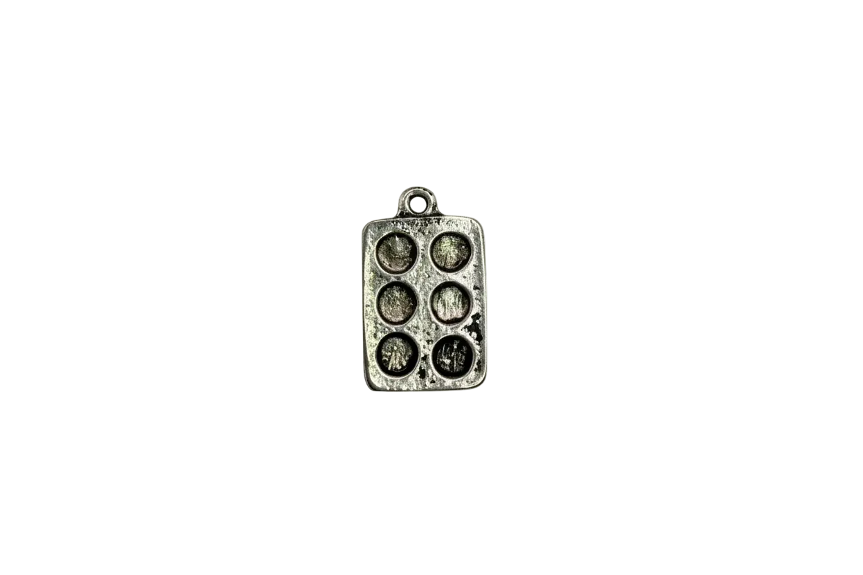 Antiqued silver muffin pan with six recessed cups