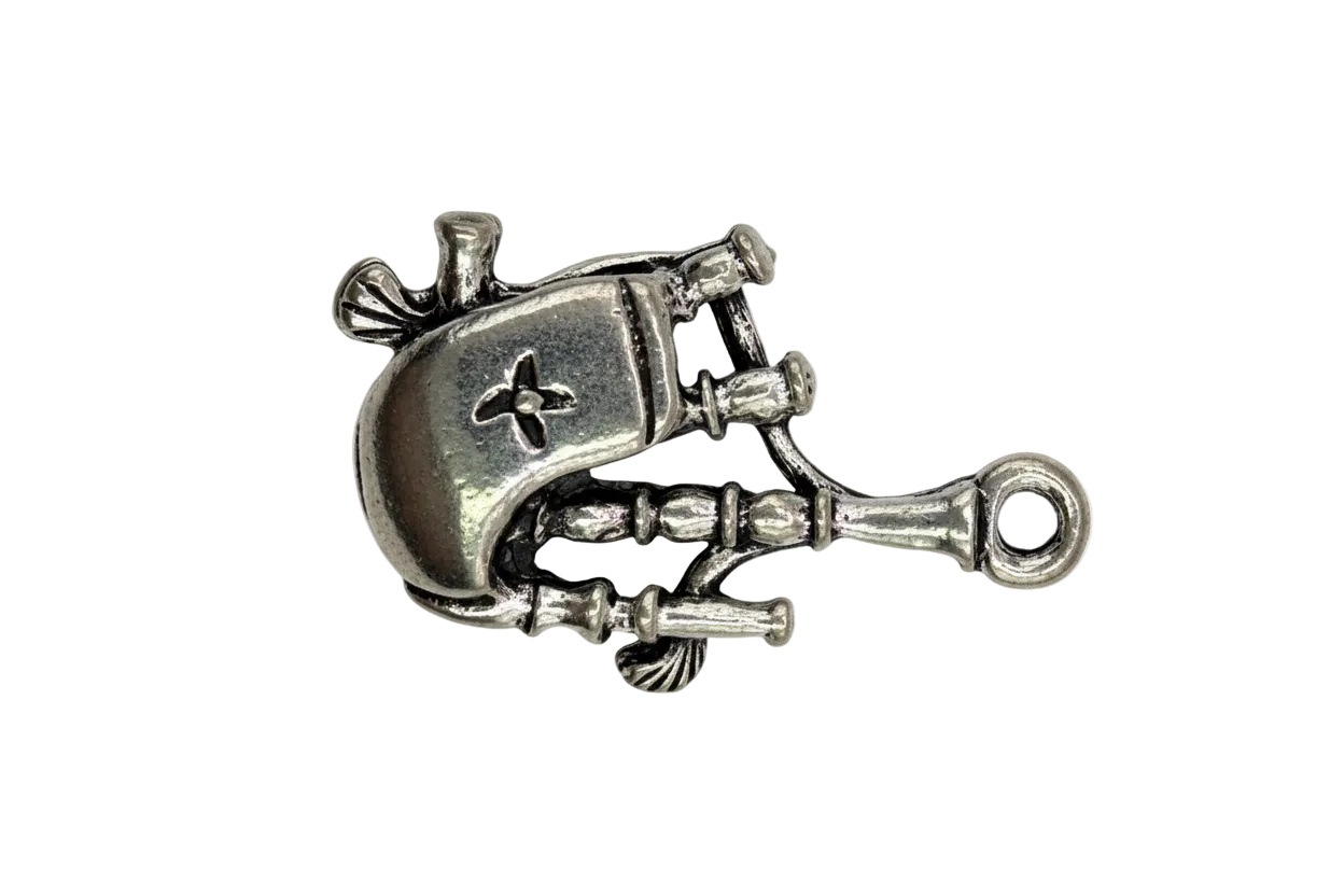 Antique silver wind-up robot charm with sculpted mechanical details on a black background