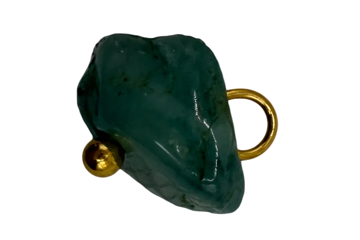 Polished deep green elephant head with gold accents on black background