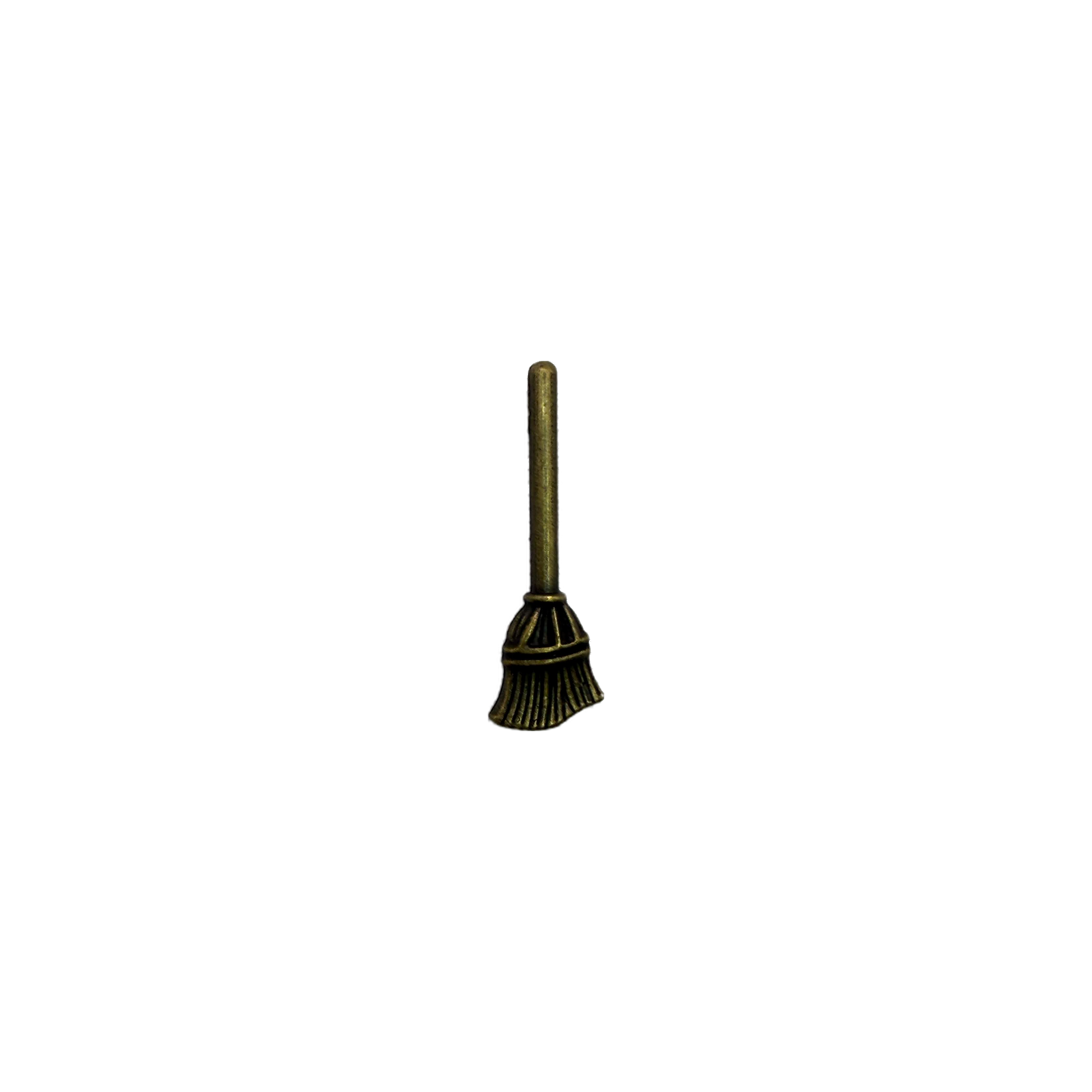 Antique gold broomstick with sculpted bristles