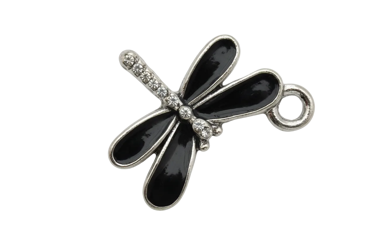 Glossy black dragonfly charm with silver-tone outline on black background