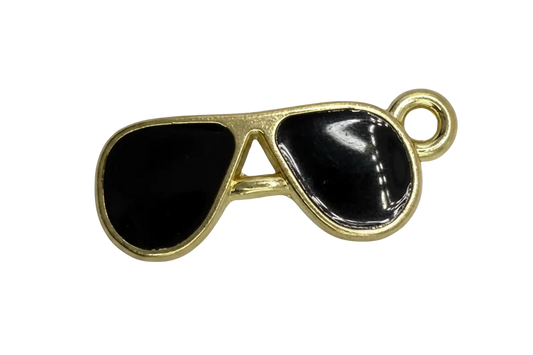 Gold aviator sunglasses charm with glossy black lenses and a small clear crystal accent