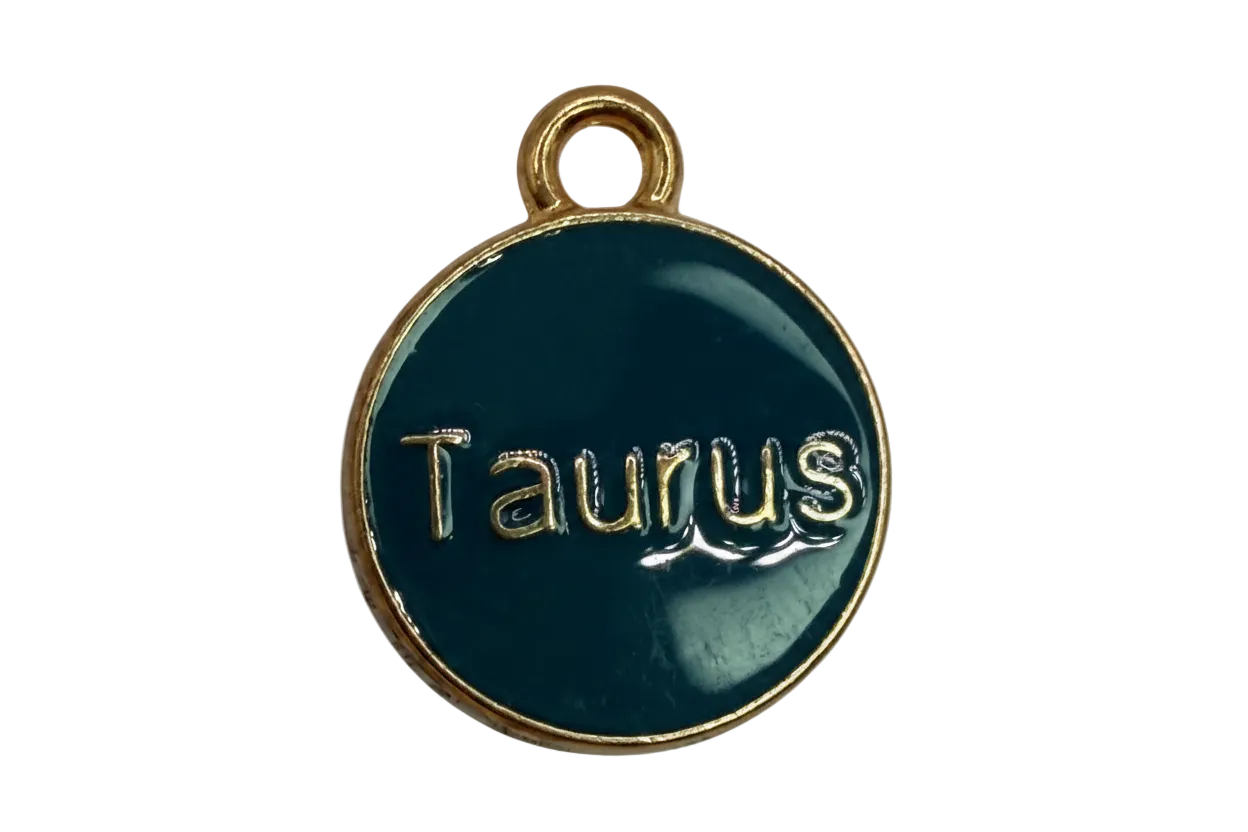 Round teal enamel coin with raised gold "smile" lettering and gold rim