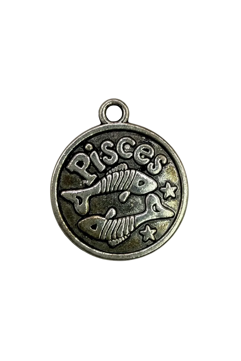Antiqued silver Pisces coin with two fish, stars, and raised Pisces lettering