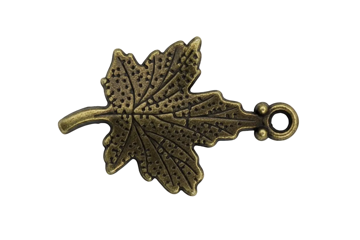 Antiqued gold maple leaf with detailed veins and textured finish