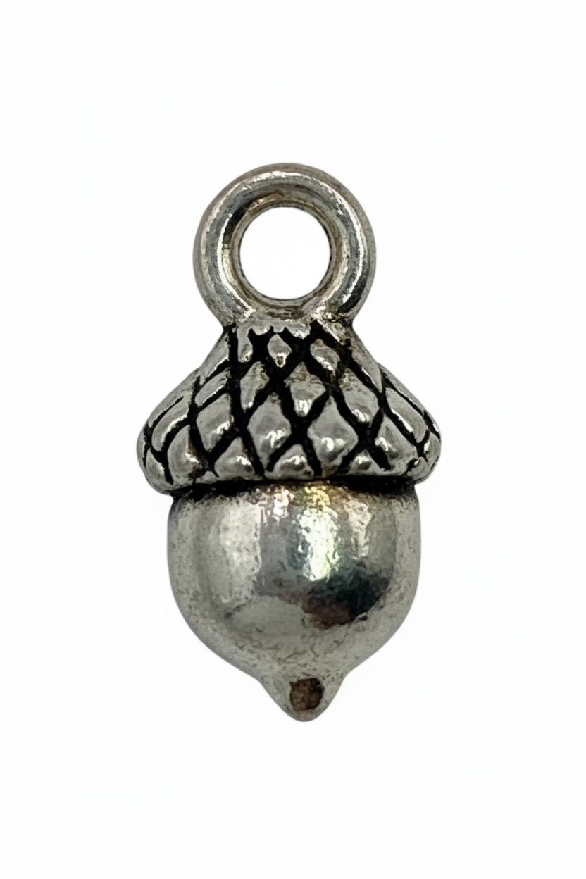 Antiqued silver acorn pendant with textured cap and polished nut