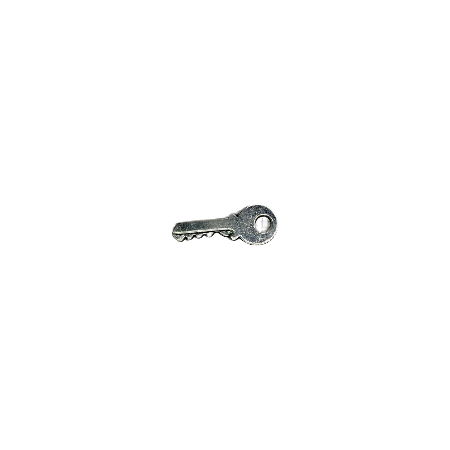 Silver key charm with round bow detail