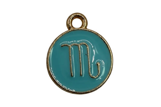 Glossy teal enamel round medallion with raised gold abstract symbol and gold rim