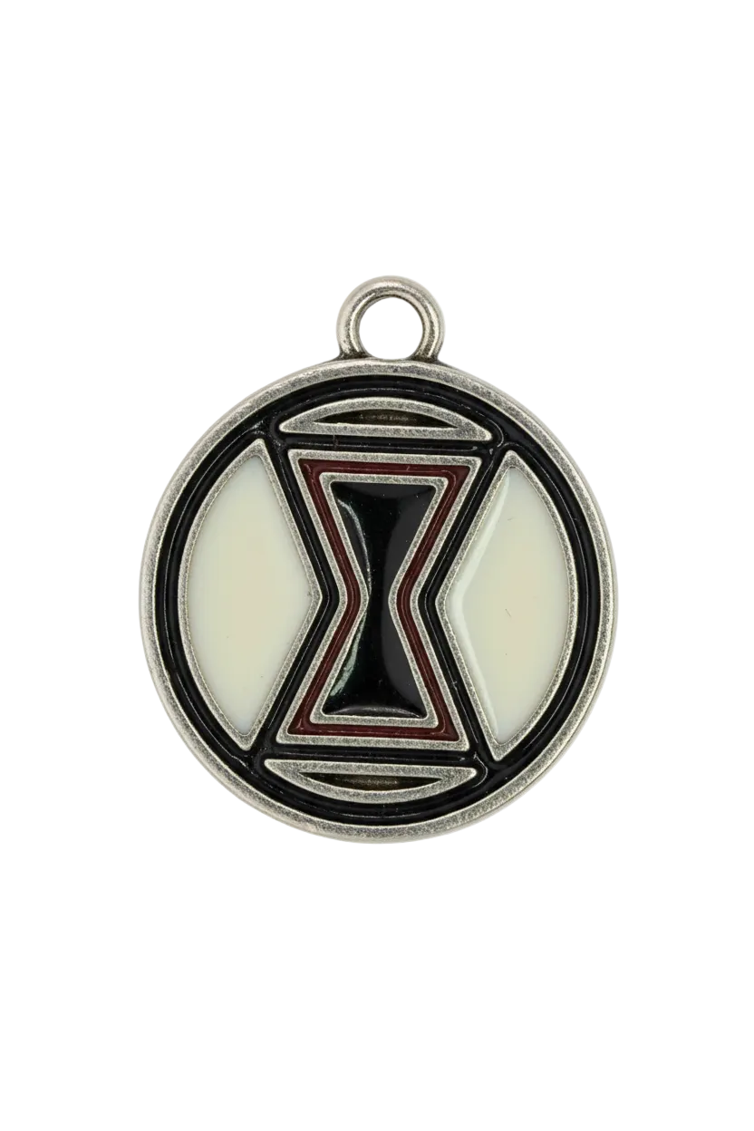 Round silver-tone medallion with black and ivory enamel hourglass motif and thin red accent