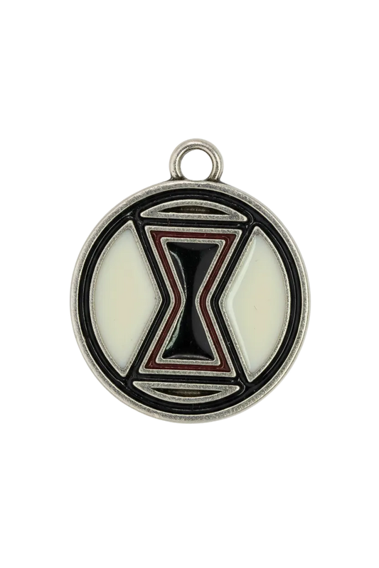 Round silver-tone medallion with black and ivory enamel hourglass motif and thin red accent