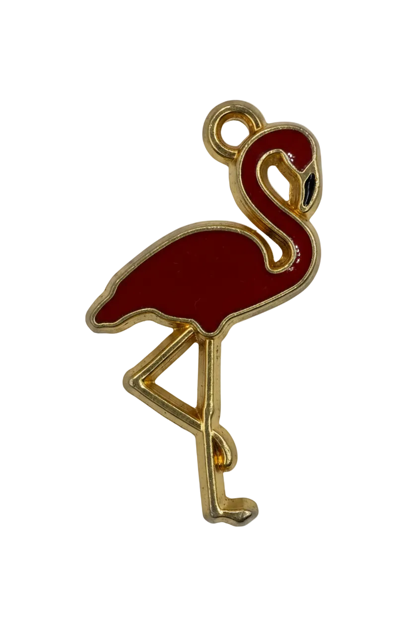 Red enamel key charm with gold outline on black background