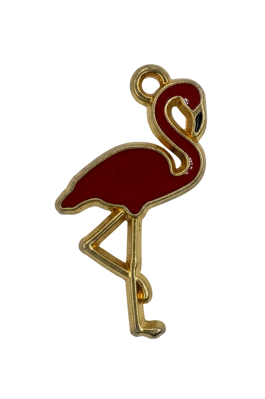 Red enamel key charm with gold outline on black background