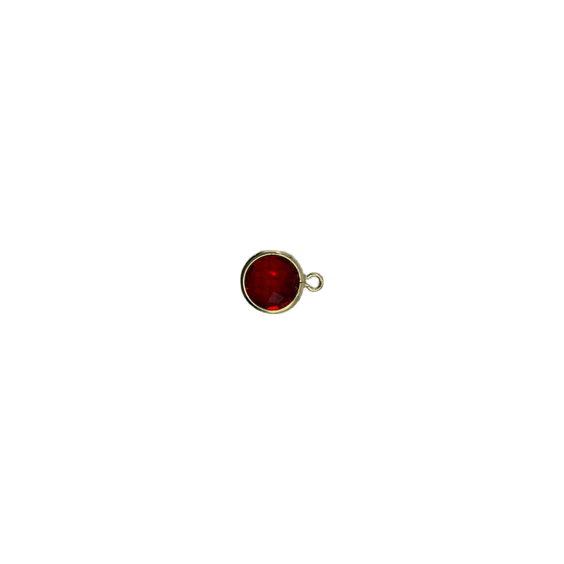 Faceted red round gem framed in gold