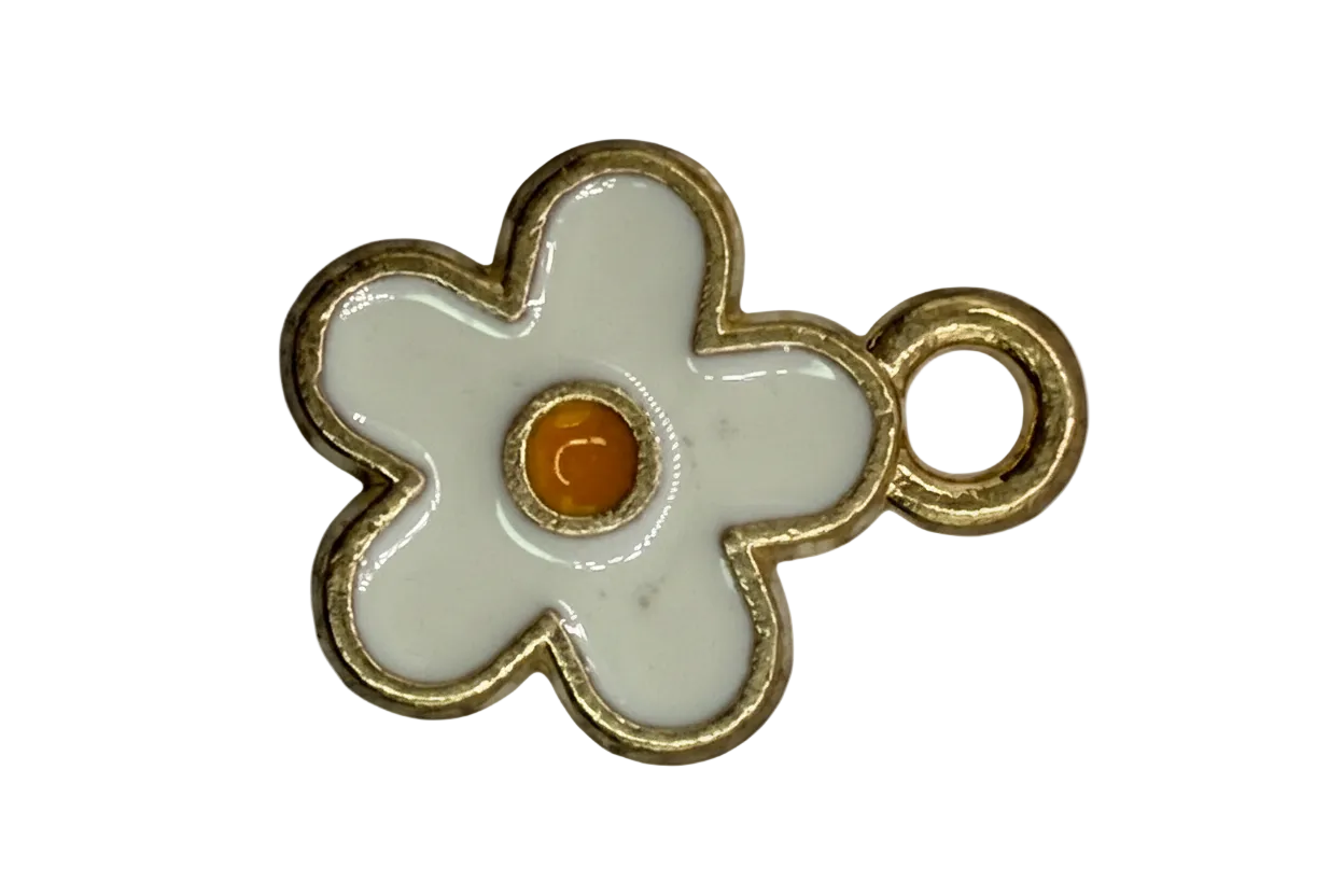 White enamel-style flower with gold outline and orange center gem