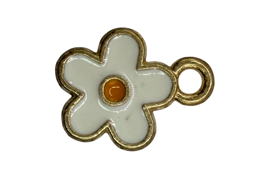 White enamel-style flower with gold outline and orange center gem
