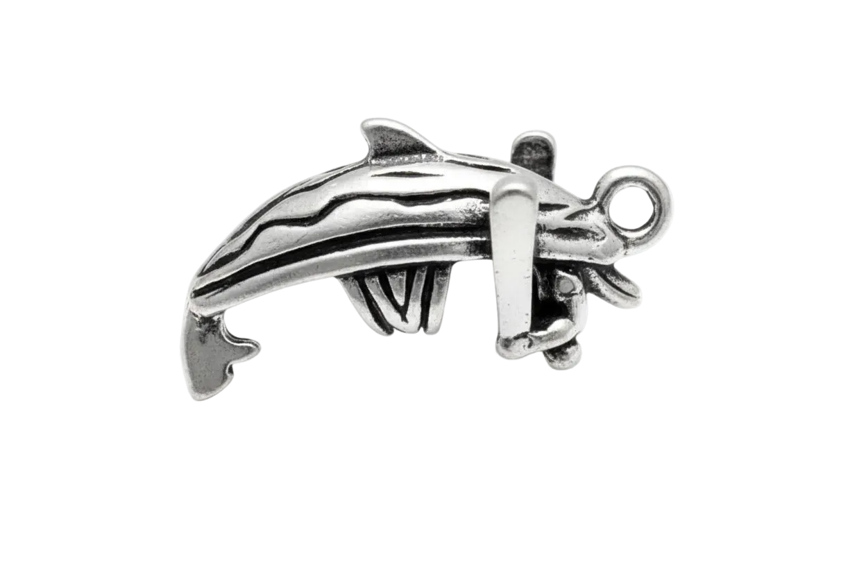Polished silver dolphin charm with sculpted ridges and antiqued details