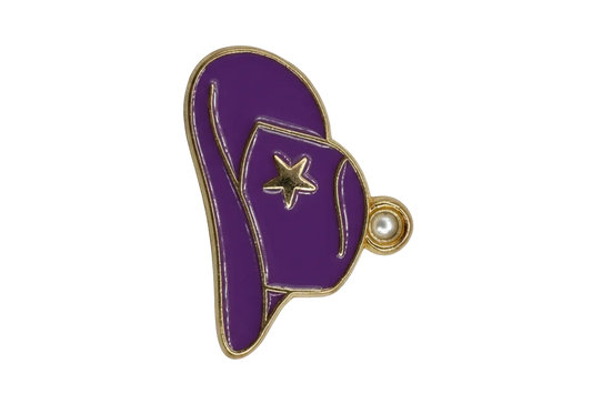 Purple enamel cowboy hat with gold outline, star detail, and small clear gem accent