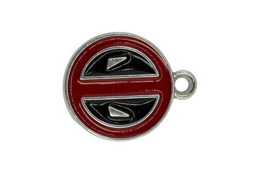 Round red and black enamel steering wheel disc with silver outline