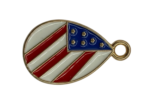 Gold-outlined teardrop with red and white stripes and a blue star field in glossy enamel