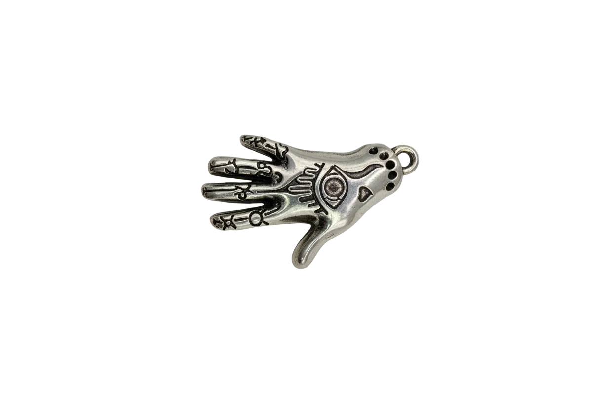 Silver hamsa hand with engraved eye and dark detailing