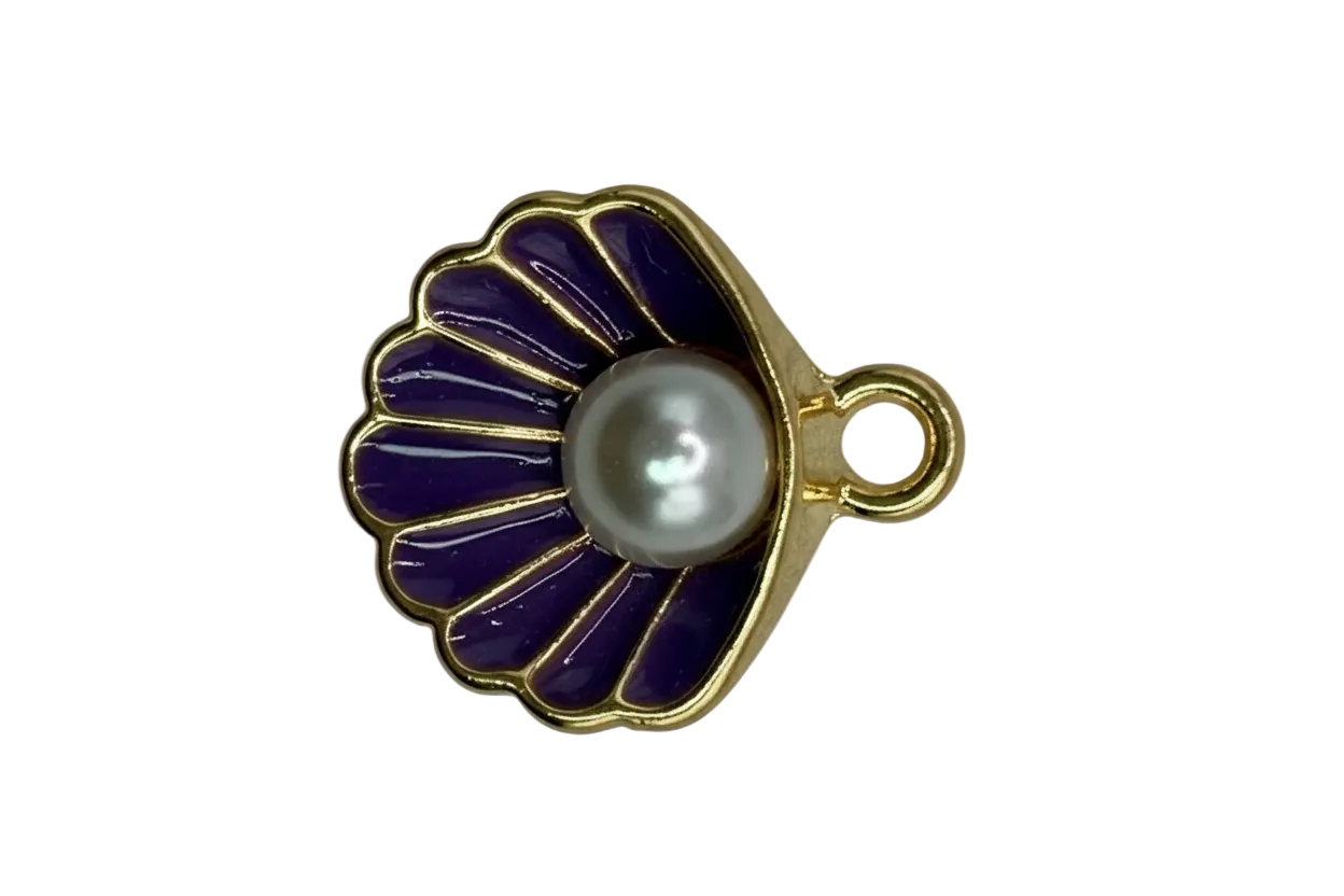 Gold scallop shell with glossy purple enamel and a pearl-like center
