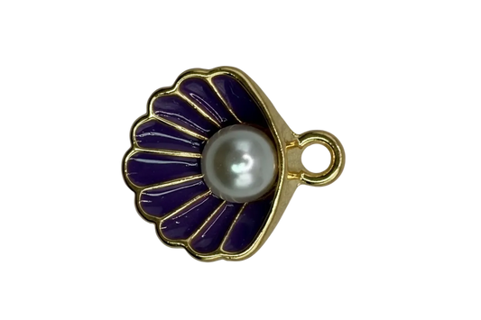 Gold scallop shell with glossy purple enamel and a pearl-like center