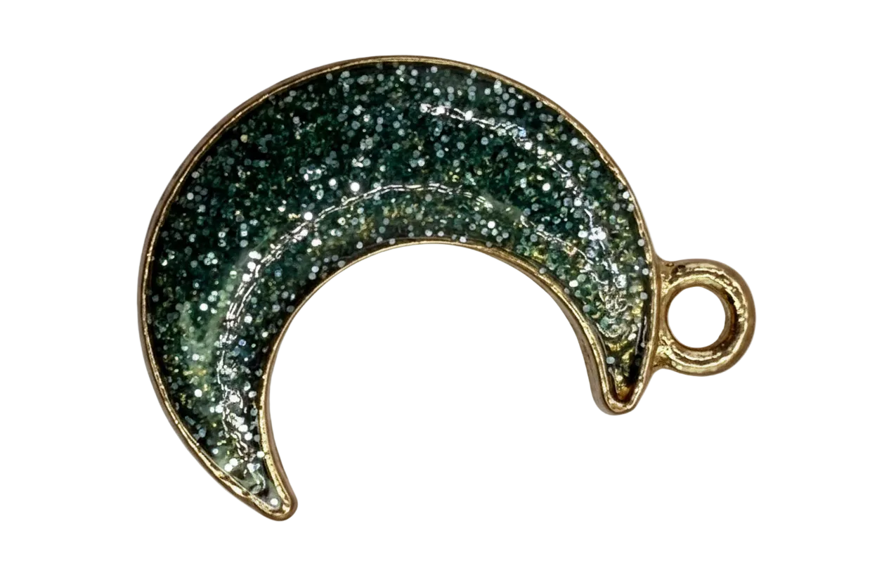 Gold crescent moon charm with dark green glitter enamel and small clear gem accent