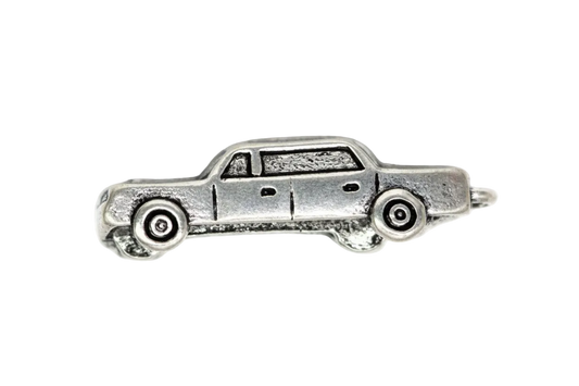 Silver-tone upside-down car charm with engraved wheels and underside details