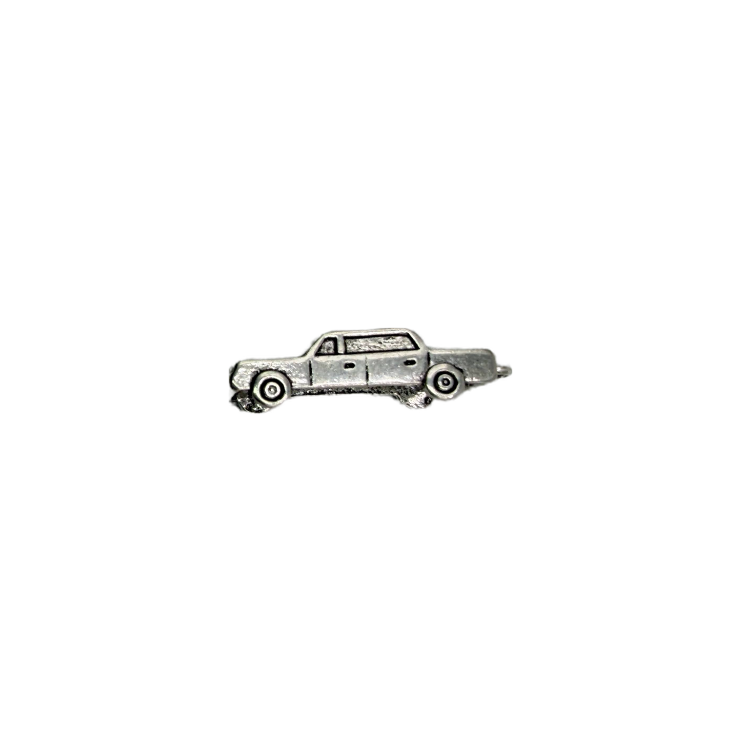Silver-tone upside-down car with engraved wheel details