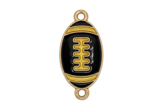 Glossy black enamel football with gold detailing