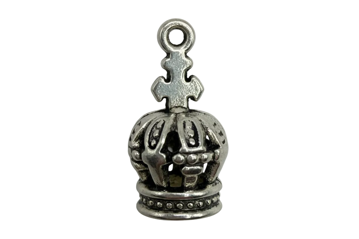 Antiqued silver crown pendant with ornate raised details and darkened recesses