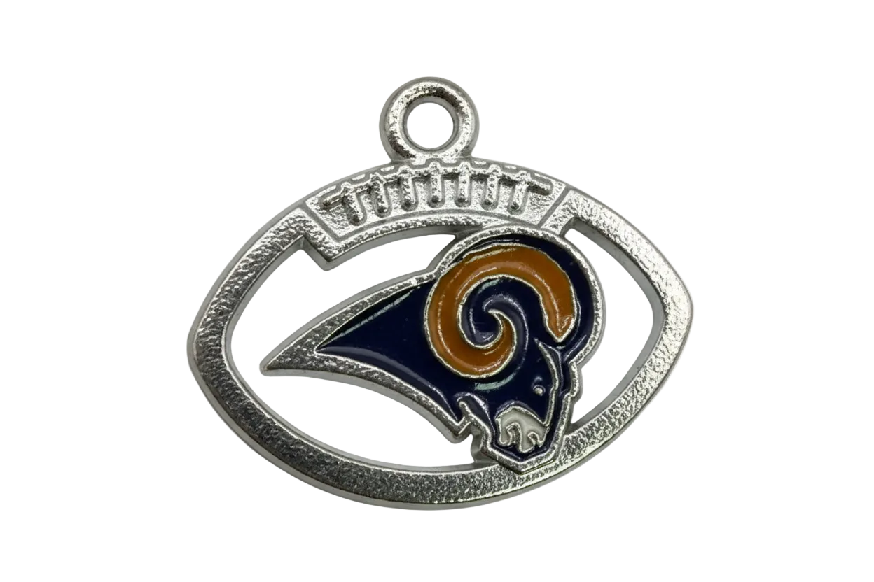 Silver oval emblem with navy ram head and gold enamel accents