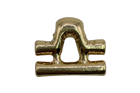 Polished gold Libra zodiac symbol with arched bar motif
