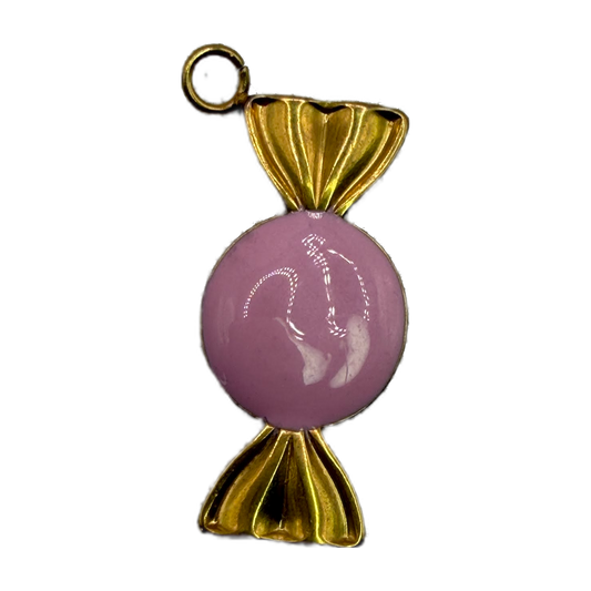 Glossy pastel pink wrapped candy charm with polished gold wrapper details