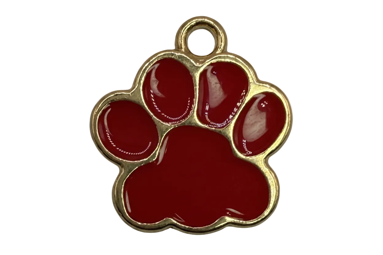 Gold-framed red enamel paw print charm with glossy finish