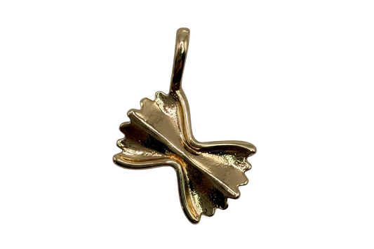 Polished gold ginkgo leaf charm with sculpted veins on black background
