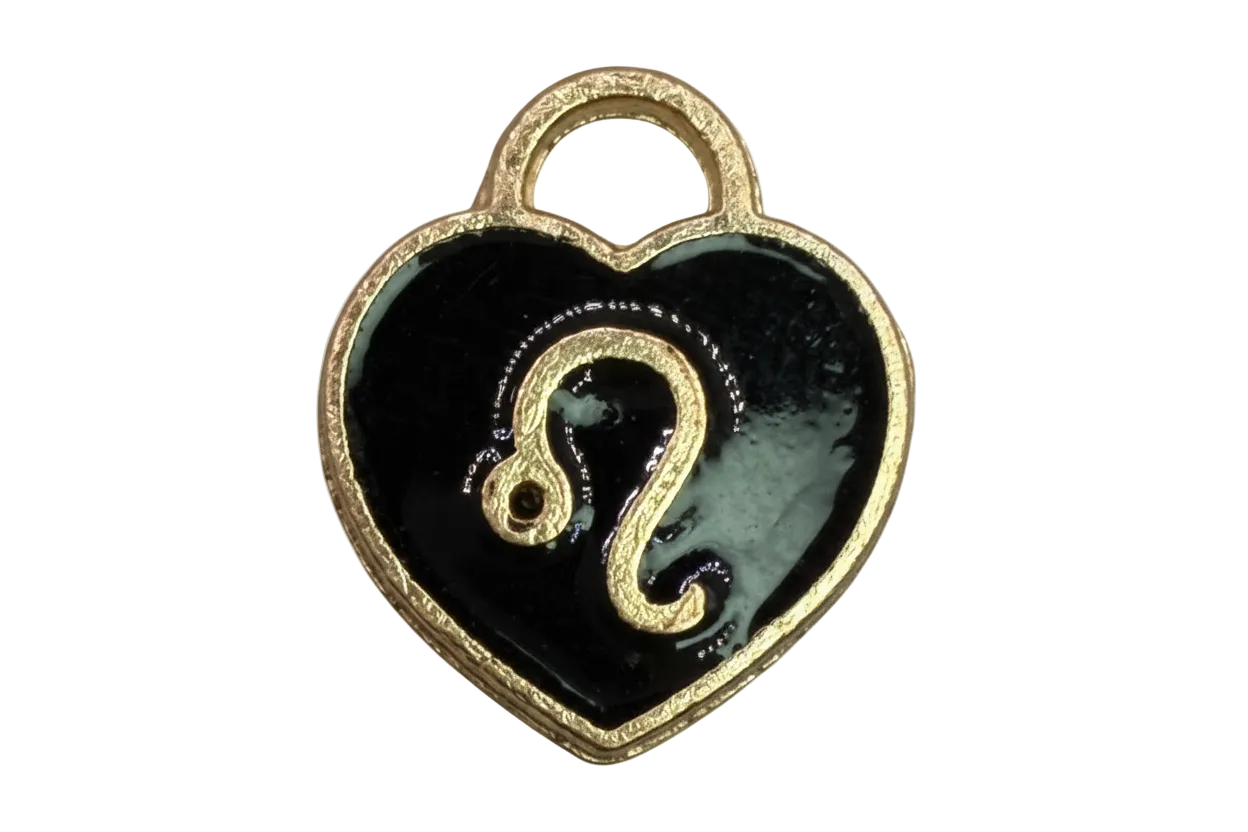 Glossy black heart with raised gold question mark and textured gold edge