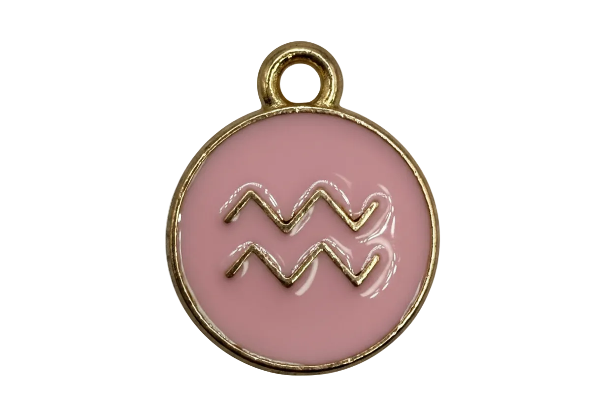 Blush pink round enamel Aquarius zodiac disc with raised gold symbol and gold border