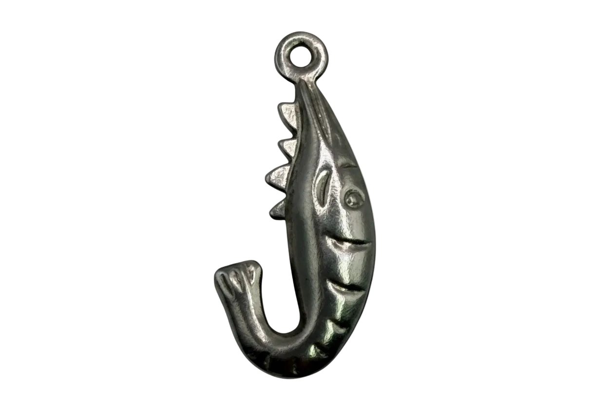 Antiqued silver fish pendant with curled tail and sculpted fin details