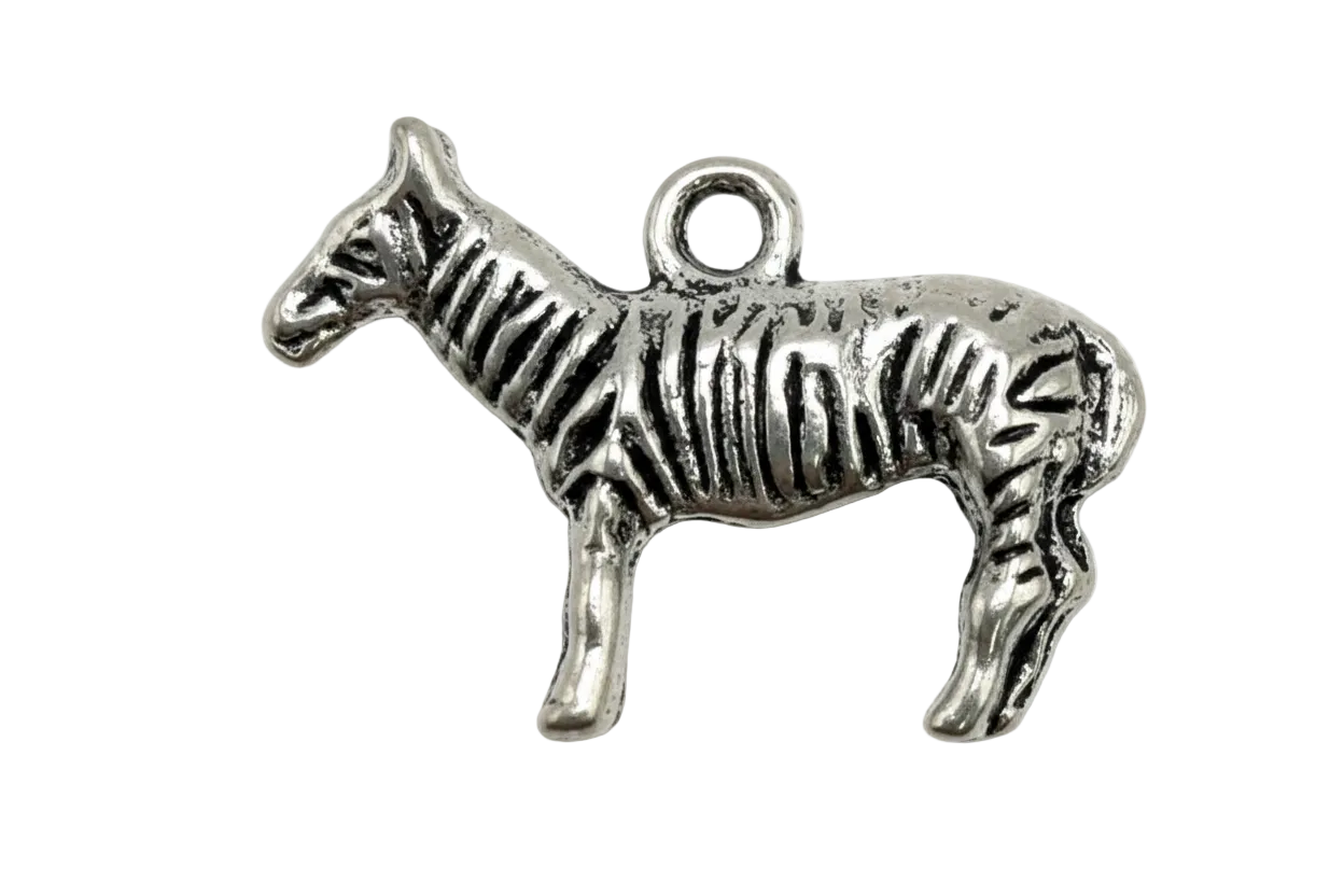 Silver zebra figure charm with engraved stripes and polished finish