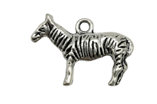 Silver zebra figure charm with engraved stripes and polished finish