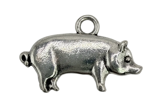 Polished silver-tone mini pig silhouette charm with rounded body and snout