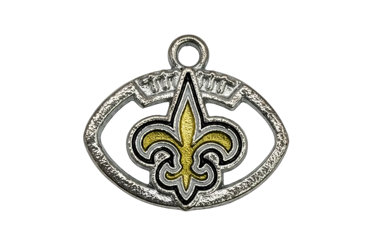Textured silver-tone oval emblem with a gold fleur-de-lis and raised lettering