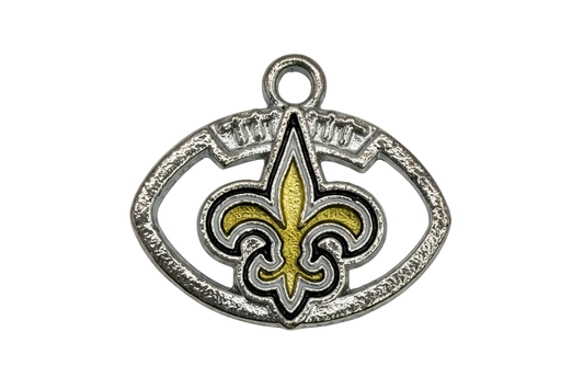 Textured silver-tone oval emblem with a gold fleur-de-lis and raised lettering