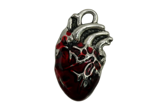 Dark red anatomical heart charm with silver-toned detailing and glossy finish