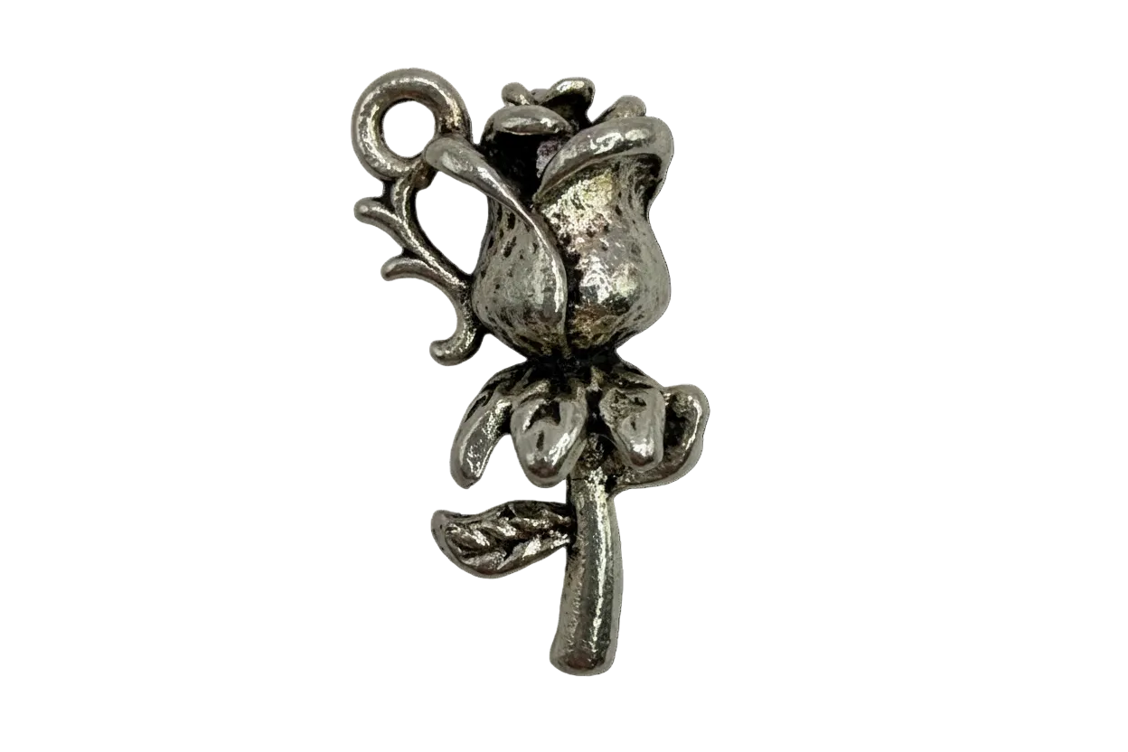 Antique silver rosebud flower charm with textured petals and oxidized detail