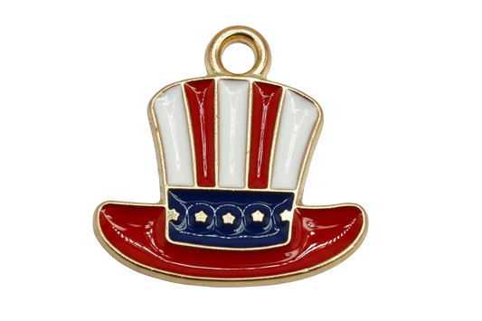 Red, white, and navy enamel top hat with gold outline and small star details